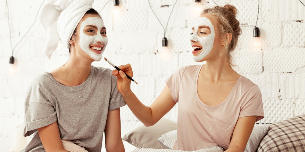 Girls applying face masks image