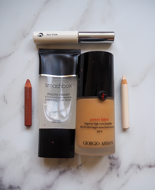 Makeup products flatlay image